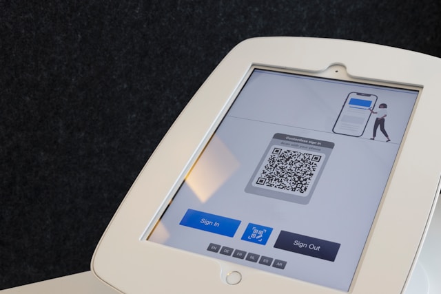 A QR code displayed on a touch screen