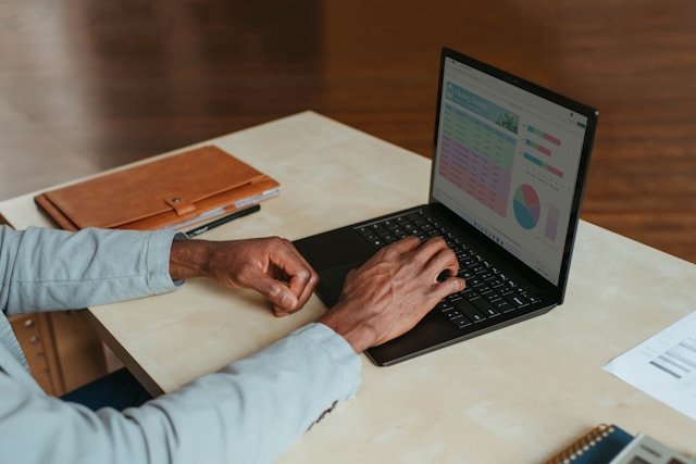 Someone using a laptop